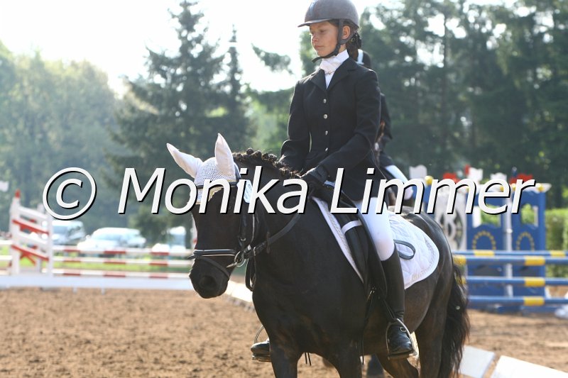 104M5237_Donna Tella_Dressur E.JPG